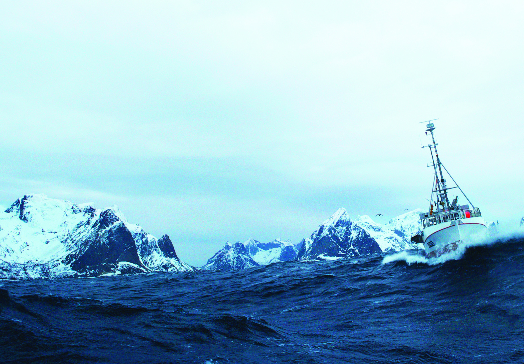 Fiskebåt, hav og fjell